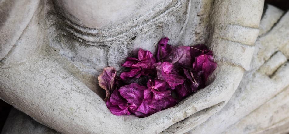 statue with flowers