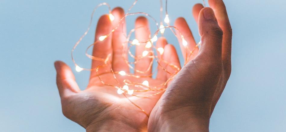 hands holding light