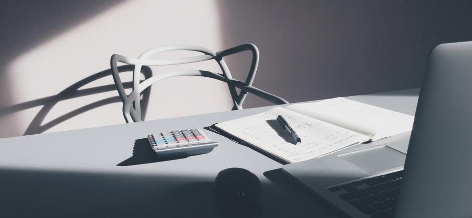 calculator at a desk