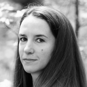 Grayscale image of woman with dark long hair