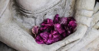 statue with flowers