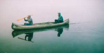 two men in a canoe