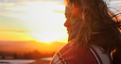 Woman looking at sunset